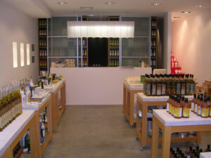 Modern shop interior with minimalist design, illuminated product displays, and inviting ambiance.